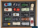 a box of assorted toy cars in a display case