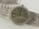 an image of a woman ' s wrist watch on a white surface