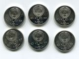 six pièces de monnaie provenant de différents pays sont représentées sur un fond blanc