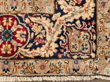 an image of a close up of a rug on a wooden floor