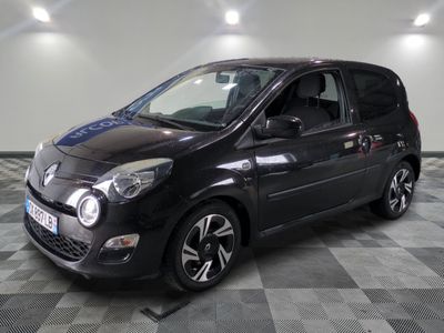 a picture of a small black car parked on a checkered floor