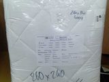 the pillow is wrapped in plastic and ready to be shipped