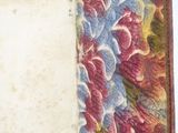 an open book with a picture of flowers on it