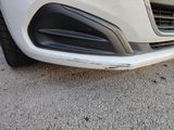 a close up of a car ' s front bumper