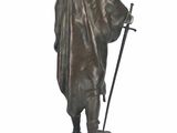 bronze statue of a man with a sword and shield on a white background