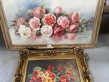 a painting of flowers in a vase on a table next to a dresser