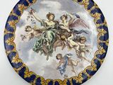 a close up of a plate with a painting on it