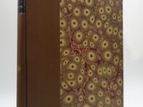an image of a book with a brown cover and a pattern on it