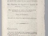 un vieux livre écrit posé sur une table