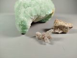 a small piece of rock and a small piece of crystal