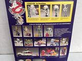 the back of a package of action figures from the ghostbuster series