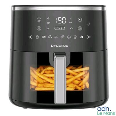 gros plan d'une friteuse avec des frites dedans