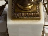 a lamp that is sitting on top of a marble block