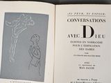 an open book with a drawing of a woman on it