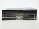 five star wars books stacked on top of each other on a white surface