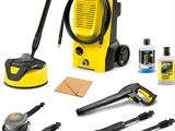 a close up of a yellow pressurer and cleaning supplies on a white background
