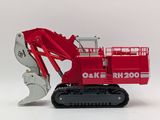 a red toy excavator that is sitting on a white surface