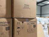 several boxes stacked on top of each other in a warehouse