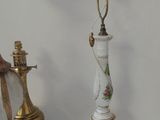 two lamps that are sitting on a white table