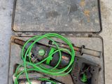 an image of a tool case with a corded drill and other tools