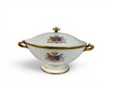 an image of a white and gold bowl with a lid