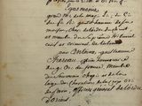 un gros plan d'un morceau de papier sur lequel on a écrit