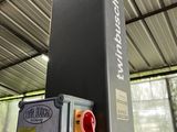 an image of a machine with a green light on it
