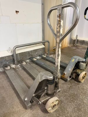 a hand truck that is sitting in a room