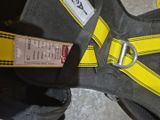 a close up of a harness with a tag on it