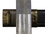 a close up of a metal object with a hammer in it