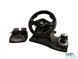 a steering wheel, pedals, and a steering wheel on a stand