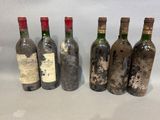 six bouteilles de vin sont alignées dans une rangée