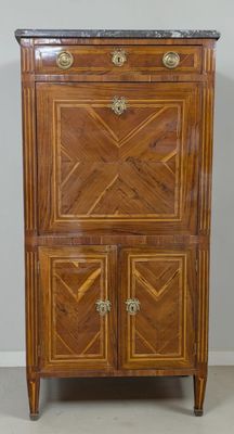 an antique wooden cabinet with marble top and two doors