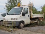 a white truck that is parked on the side of the road