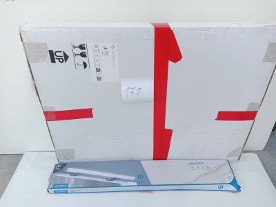 a white box with a red ribbon on it