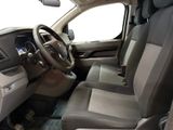 the interior of a car with a steering wheel and a dashboard