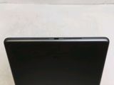 an apple laptop computer sitting on top of a white table