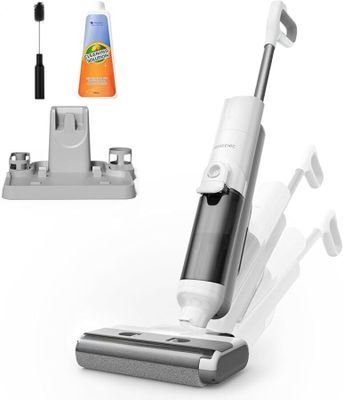 un gros plan d'un aspirateur avec une brosse à dents et du dentifrice