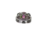 a picture of a ring with a pink flower on it