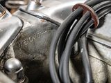 a close up of a motorcycle engine with wires