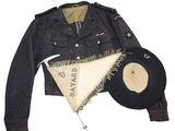 jacket, hat, and umbrella on display on white background