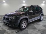 a picture of a black dacia parked in a garage