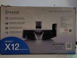 a box with a picture of a home theater system in it