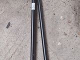 a pair of baseball bats laying on the ground