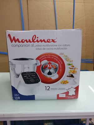 packaging of a blender sitting on top of a table in a room