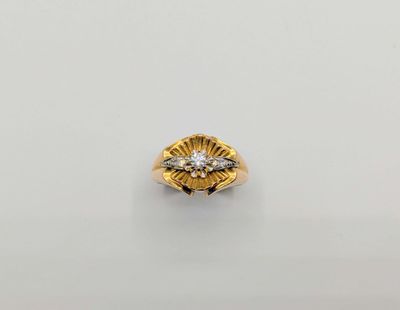 a gold and diamond ring