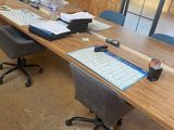 a long table with a lot of papers on it