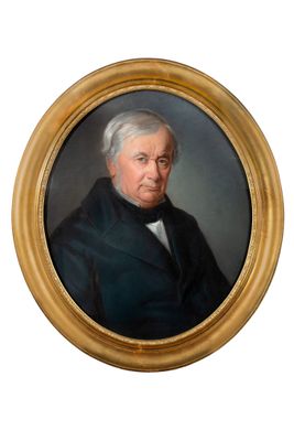 portrait of a man in a black coat and a white tie