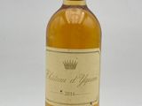 a bottle of wine that is sitting on a table