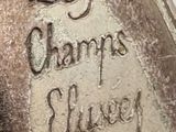 a close up of a metal object with writing on it